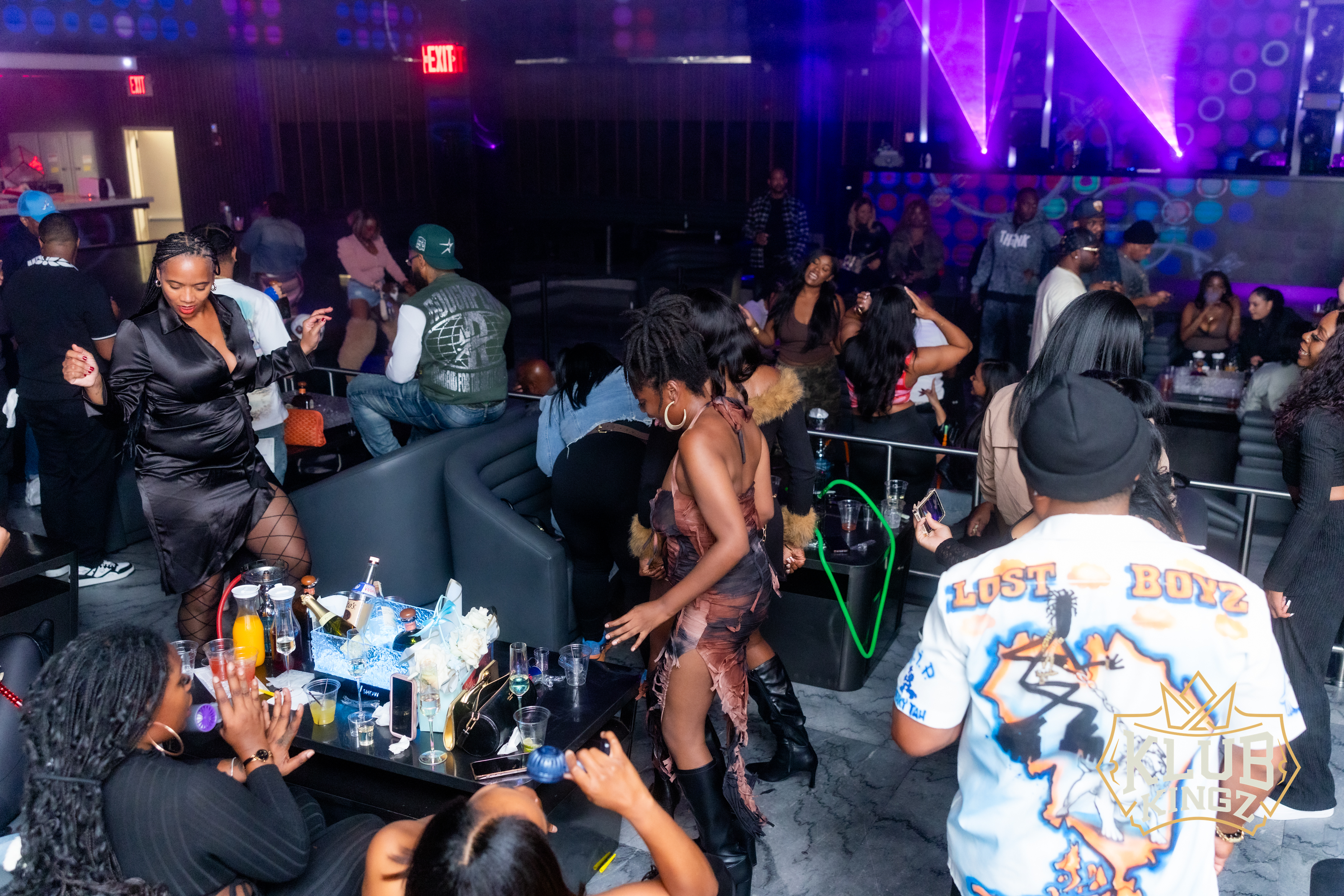 Crowded dance floor and VIP tables with guests partying at Klub Kingz nightclub