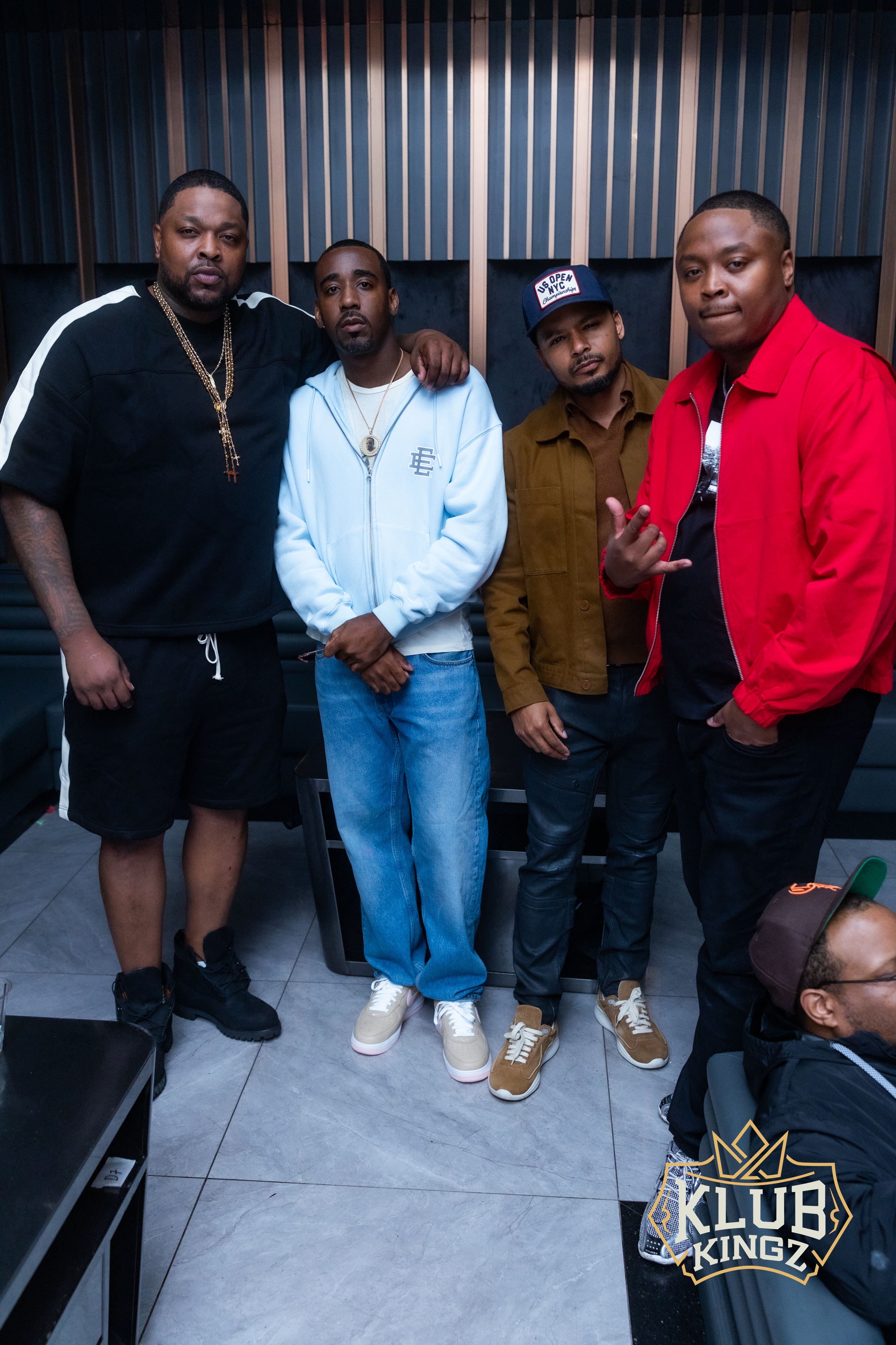 Group of four friends posing together at Klub Kingz nightlife venue