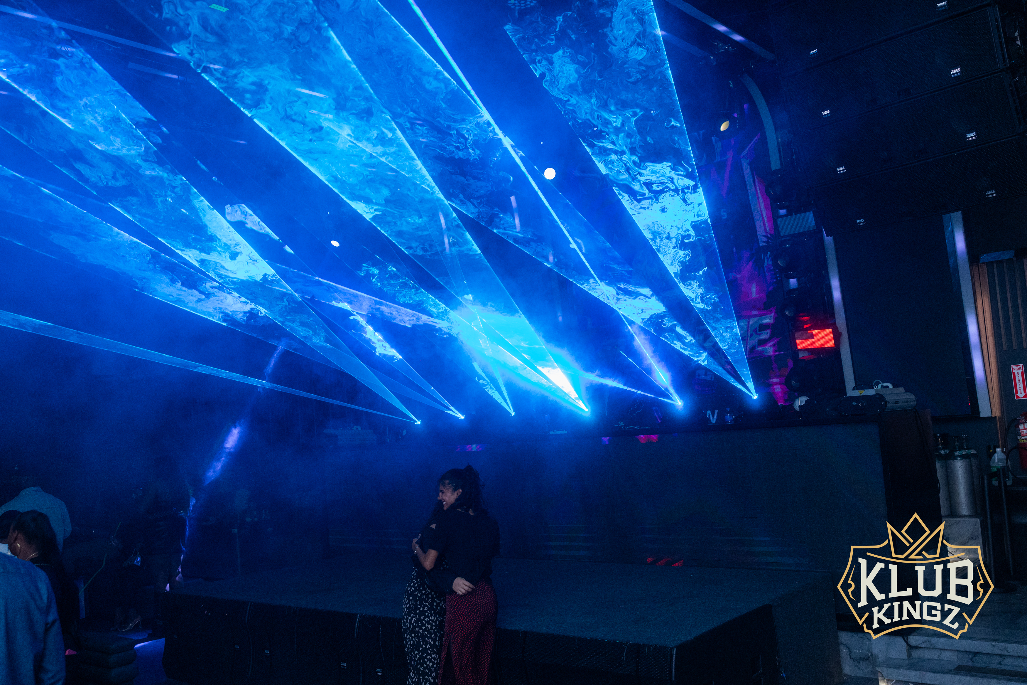 Blue laser light show over the dance floor at Klub Kingz nightclub