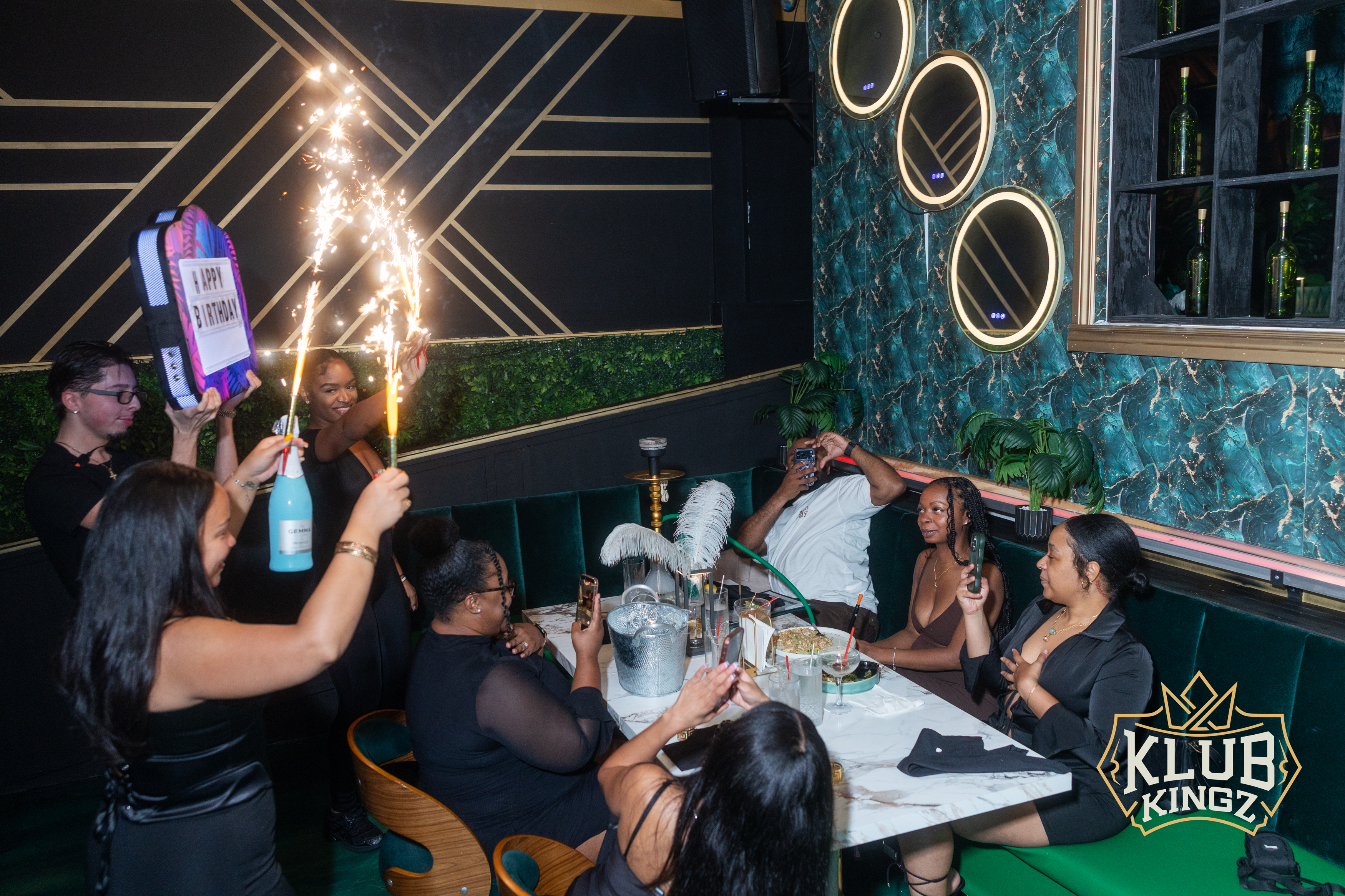 Sparkler bottle presentation for a birthday celebration at Klub Kingz nightclub booth