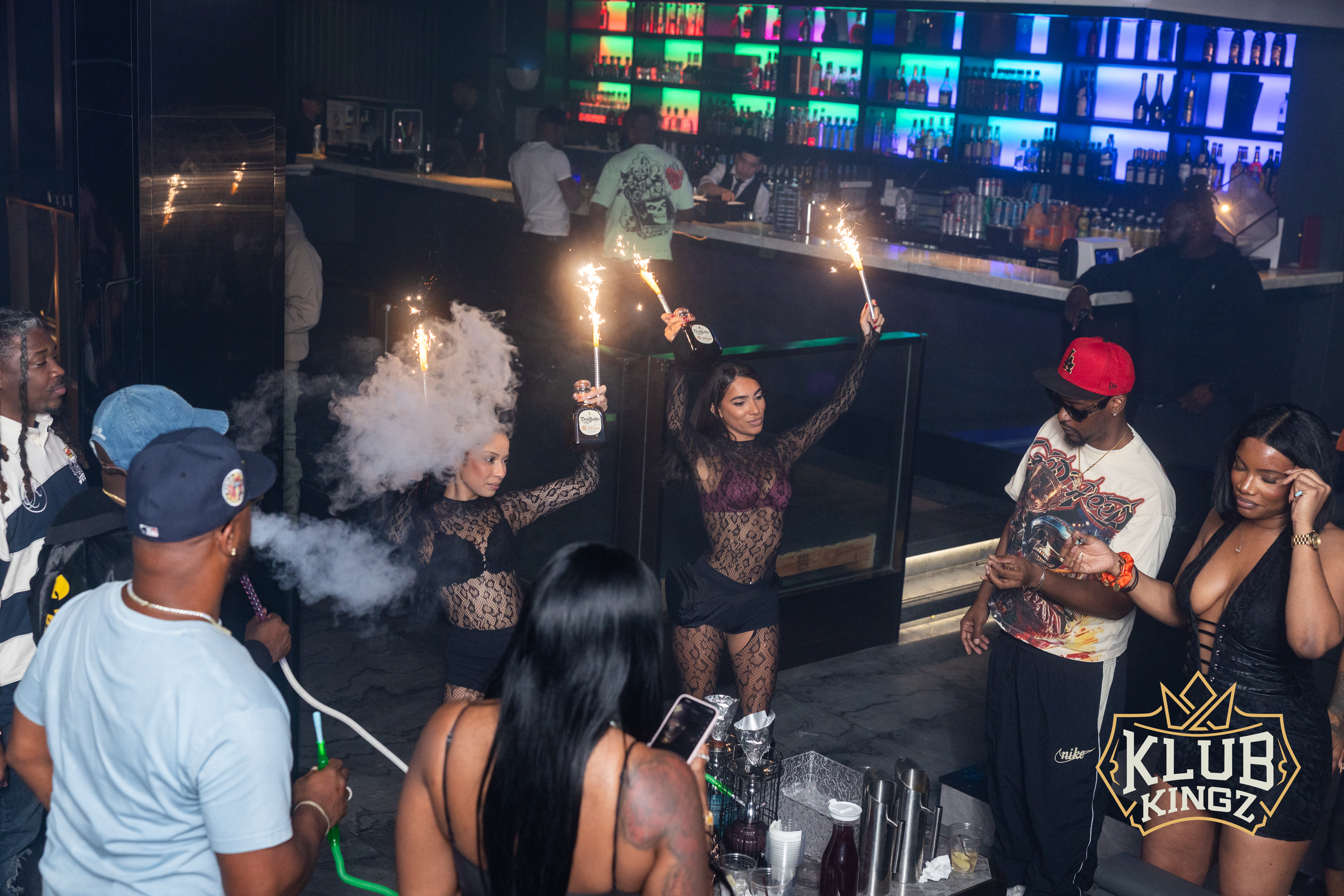 Bottle service with sparklers and hookah smoke at Klub Kingz nightclub
