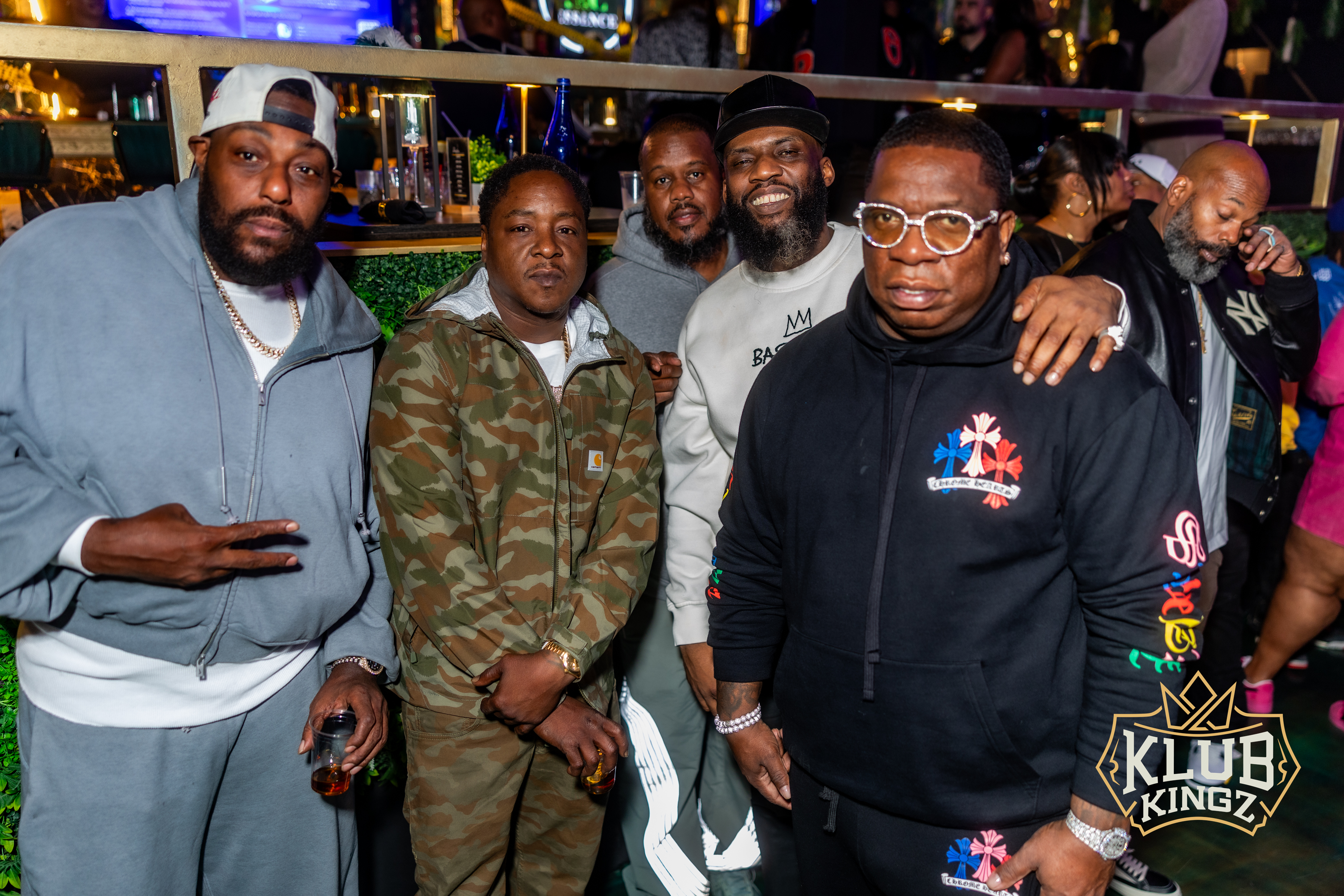 Group of friends posing together at a nightlife event at Klub Kingz
